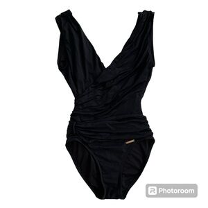 Vince Camuto One-piece swimsuit. Black with v-neck. Women’s size 6